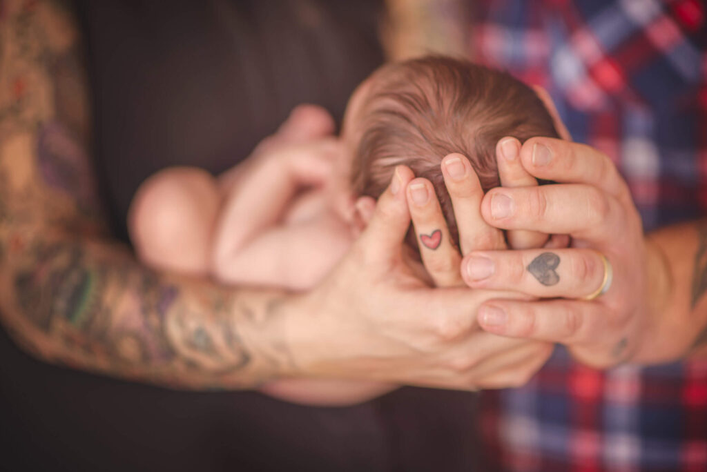 tattooed parents holding baby cheap hypnobirthing